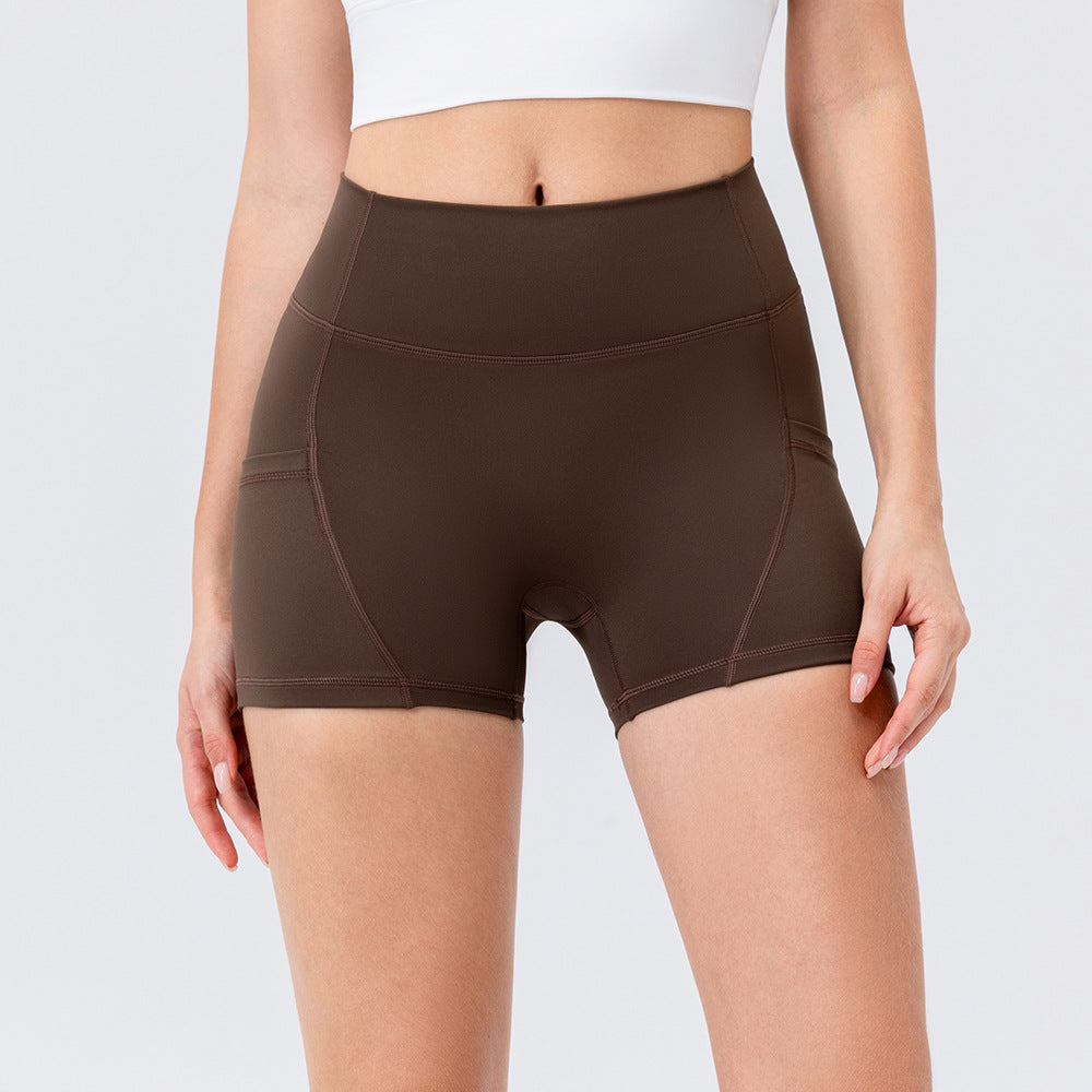 Dame Sporty Høj Talje Shorts med sidelommer og fleksibel pasform Stilla