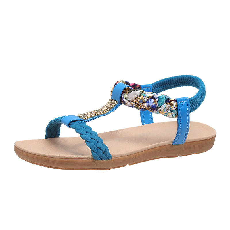 Dame sandaler i fashionable flet-design med elegante smykkedetaljer Stilla