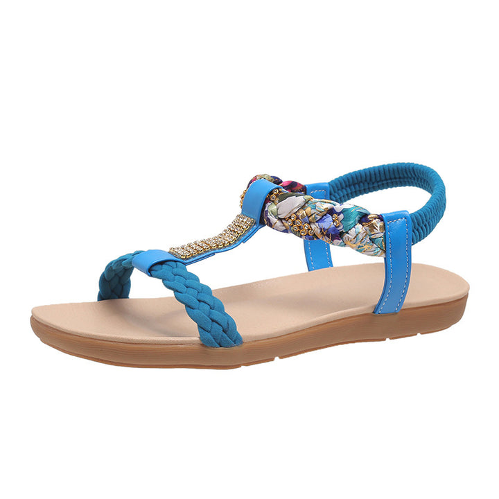 Dame sandaler i fashionable flet-design med elegante smykkedetaljer Stilla