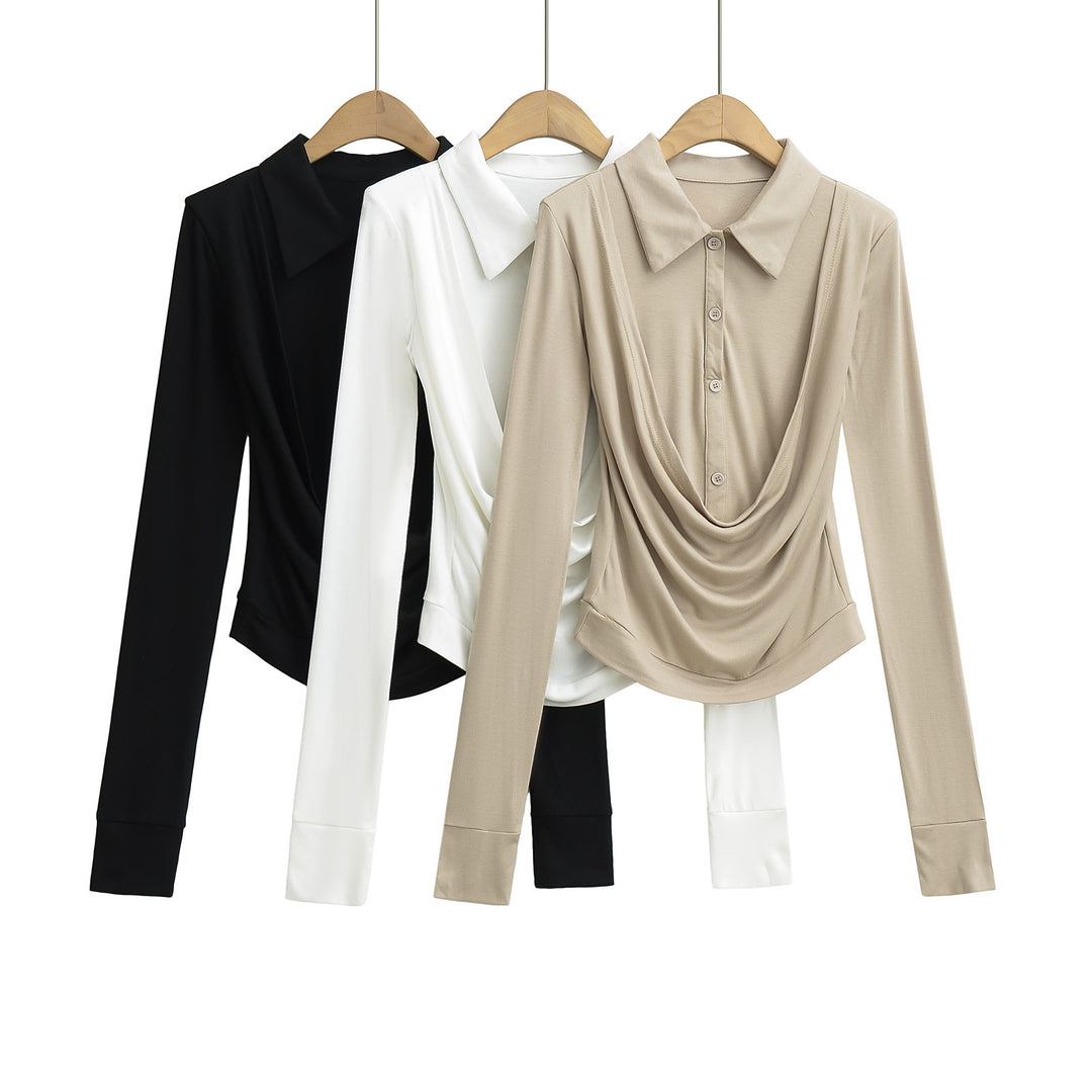 Damebluse med smart draperingseffekt og knapdetalje Stilla