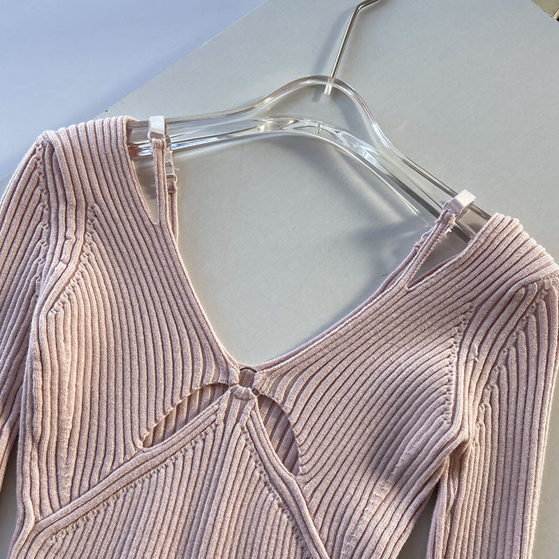 Dame strik top med raffineret design og cut-out detaljer Stilla