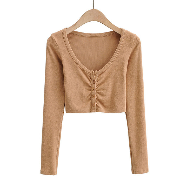 Dame cropped langærmet shirt med knapdetaljering og fin struktur Stilla