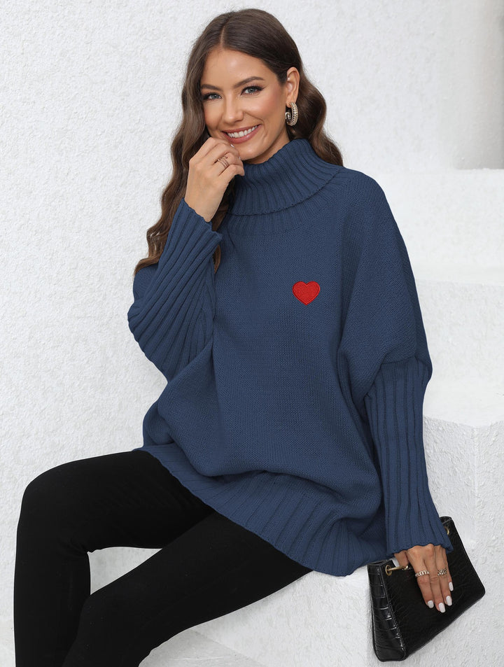 Dame Oversized Turtleneck Sweater med hjerteformet applikation og strikket mønster Stilla