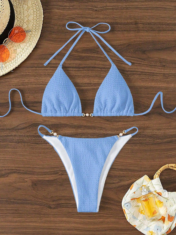 Dame triangel-bikini med moderne snøre detaljer og elegante accenter Skovae