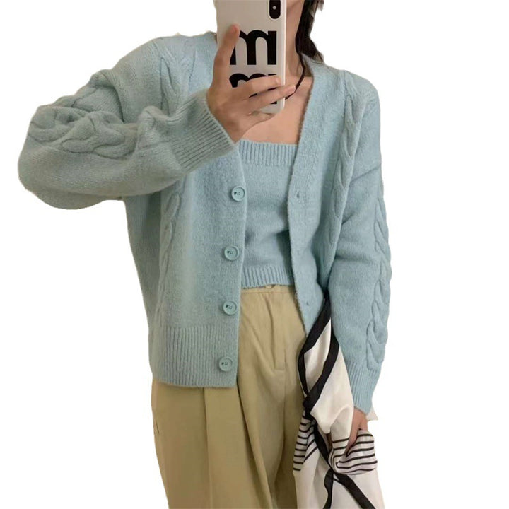 Kvinders cardigan i kabelstrikdesign med knaplukning og elegant pasform Stilla