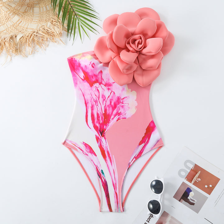 Dame badedragt med blomstret detalje og matchende sarong Stilla