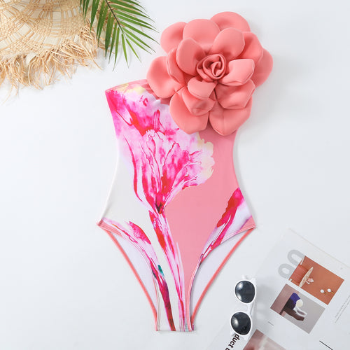 Dame badedragt med blomstret detalje og matchende sarong Stilla