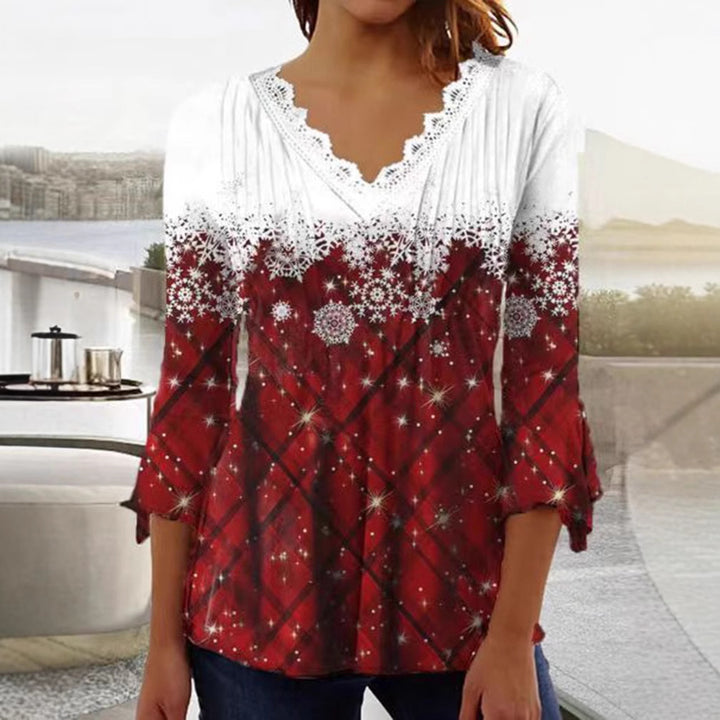 Dame nan tunika-bluse med spids v-hals, fin plissé-patch og vinterligt snefnug-print skovae