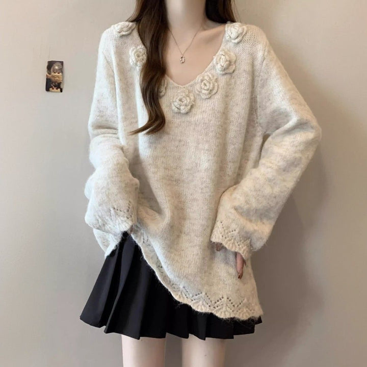 Kvinders store strikket sweater med blomsterapplikationer Stilla