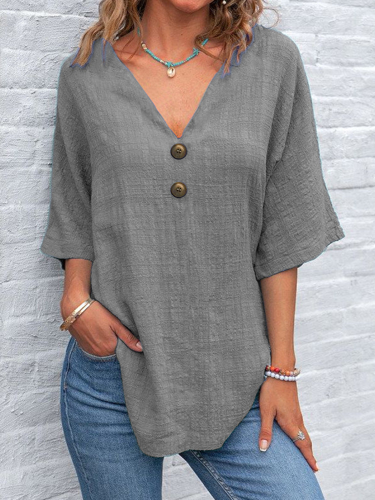 Dame V-hals bluse med knapdetaljer Skovae