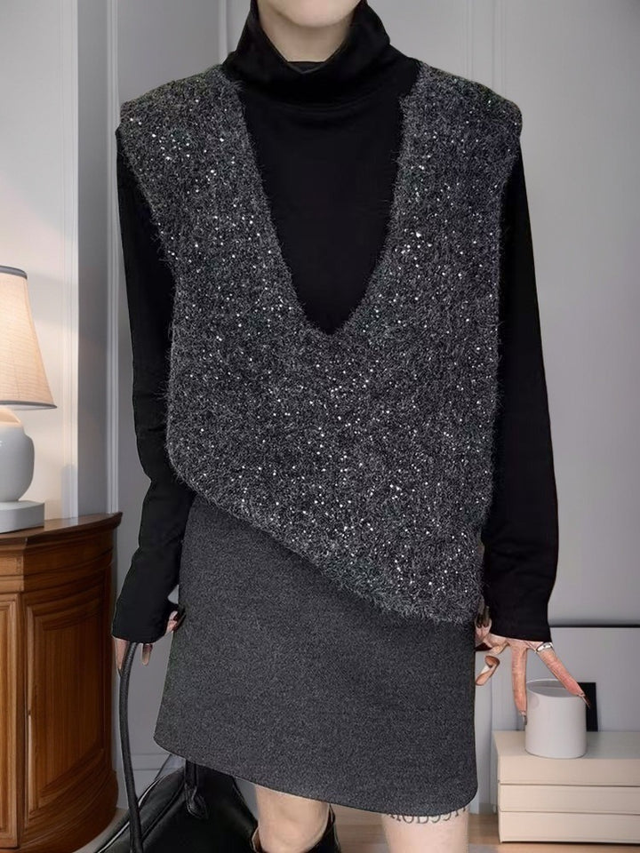 Dame fashionable strikket vest med dyb V-hals og kreativ skæring Stilla