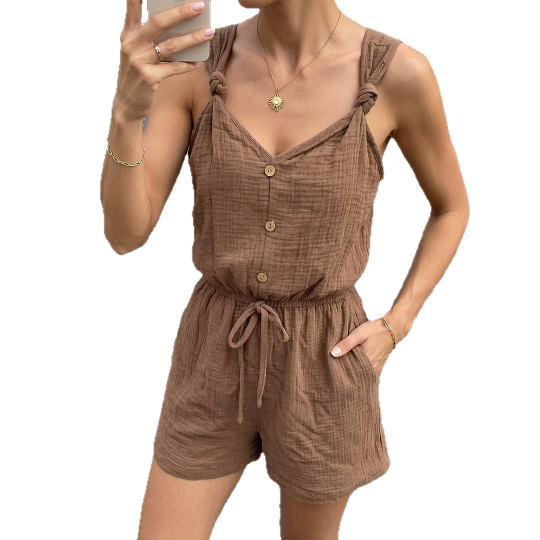 Dame afslappet jumpsuit med knapbar V-udskæring og elastisk talje Skovae