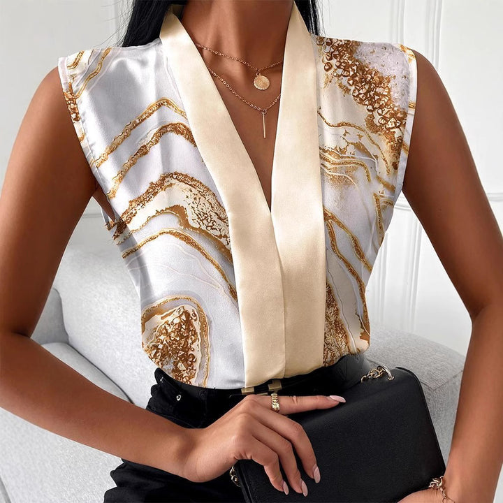 Dame modebluse i avistryk Stilla