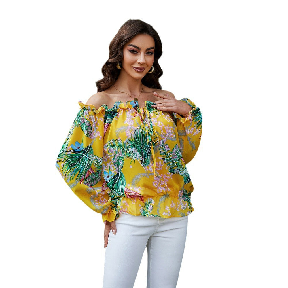 Damer off-shoulder bluse med blomsterdesign og flæsedetaljer Stilla