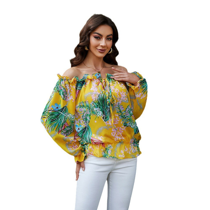 Damer off-shoulder bluse med blomsterdesign og flæsedetaljer Stilla