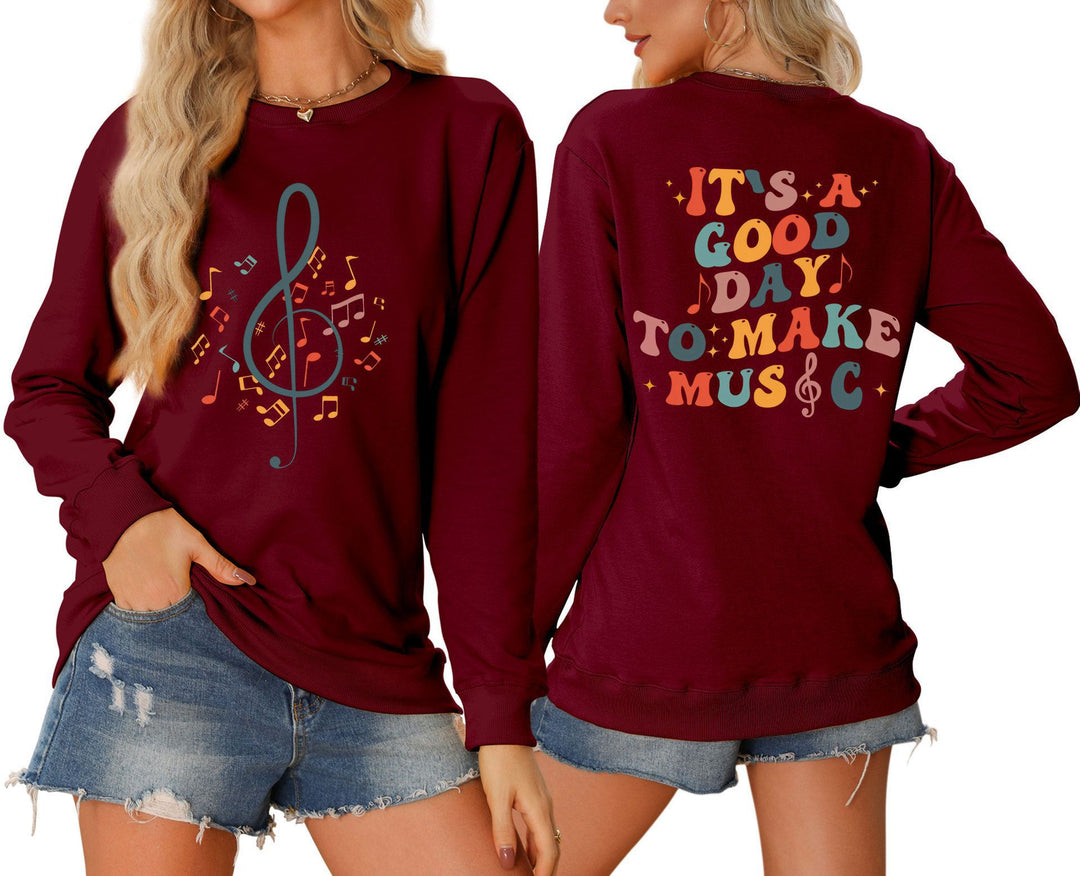 Damer sweatshirt med musikalsk motiv og kreativ tekst Stilla