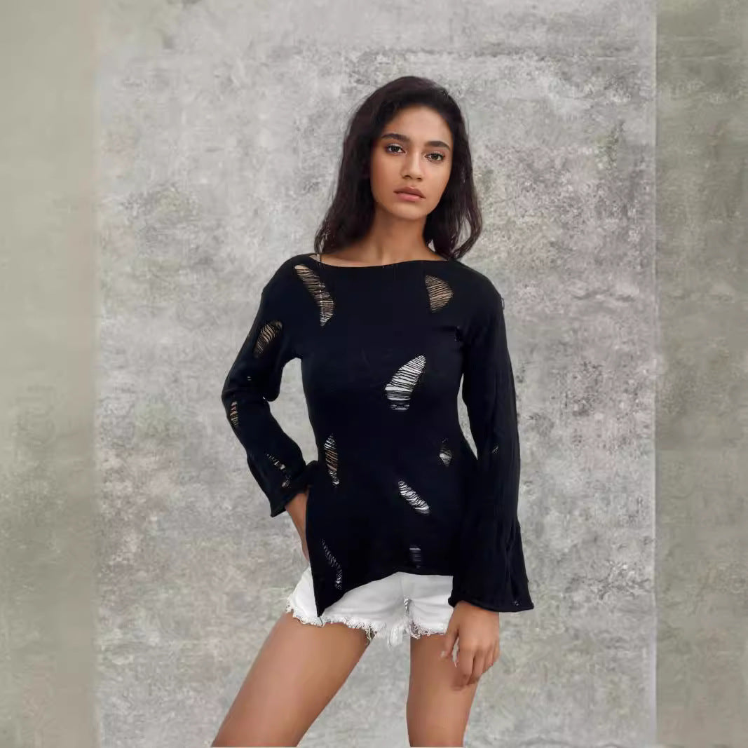 Kvinders urbane ribstrikkede sweater med slidte detaljer Stilla