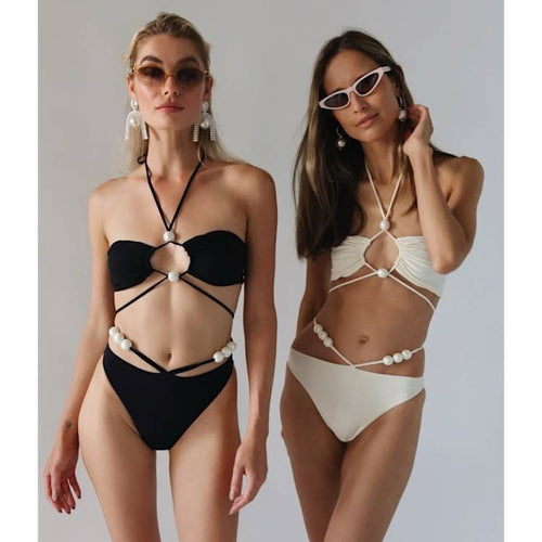 Dame bikini-sæt med raffinerede linjer og elegante perledetaljer Skovae