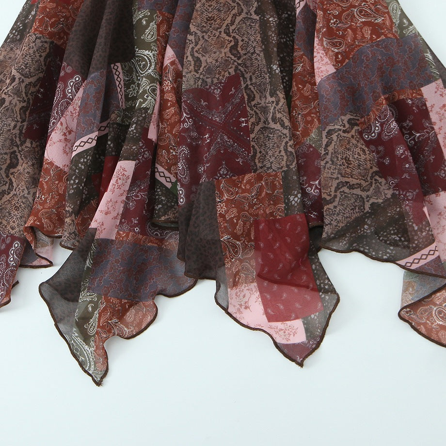 Dame vinkelkjole i moderne patchwork-design med voluminøs nederdel Skovae