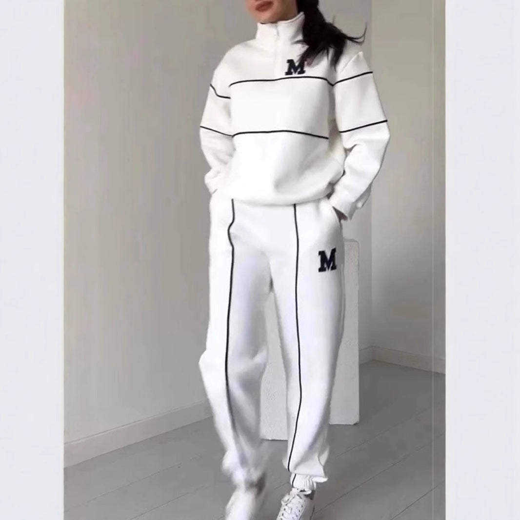 Kvinders sporty loungewear-sæt med halv lynlås og elastisk talje Stilla