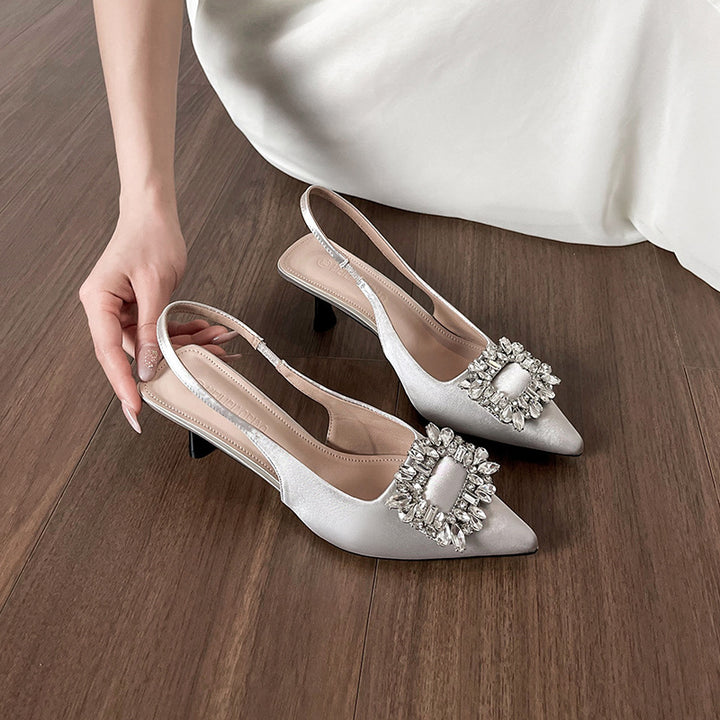 Dame Sling-Pumps med dekorativ strass-ving og elegant design Stilla