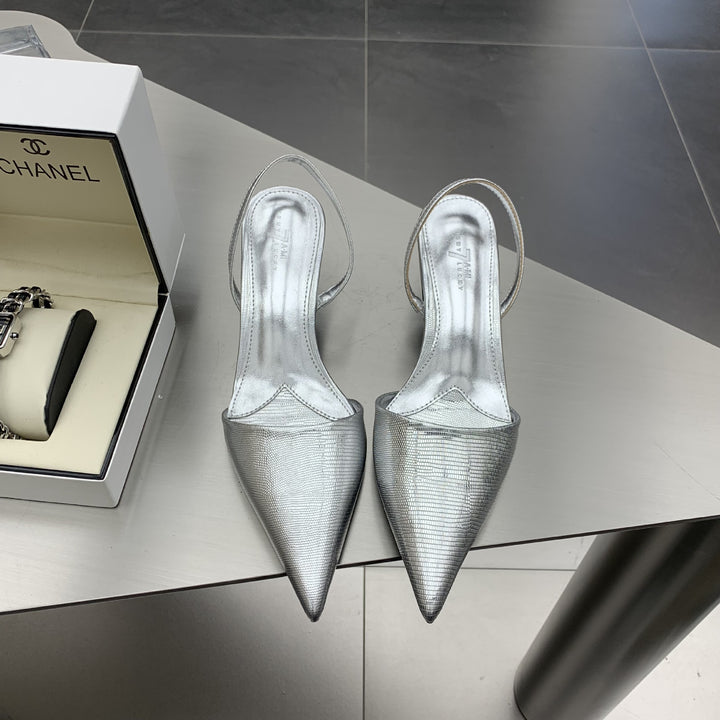 Dame Sling-pumps med elegant spids og fashionable teksturer Stilla