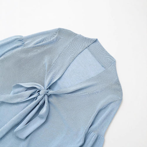 Kvinders luftbluse med romantiske ruffle-detaljer og bindebånd Stilla