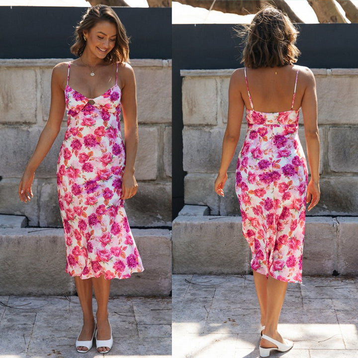 Dame sommerligt midi-kjole med delikat floral-design og smalle stropper Stilla