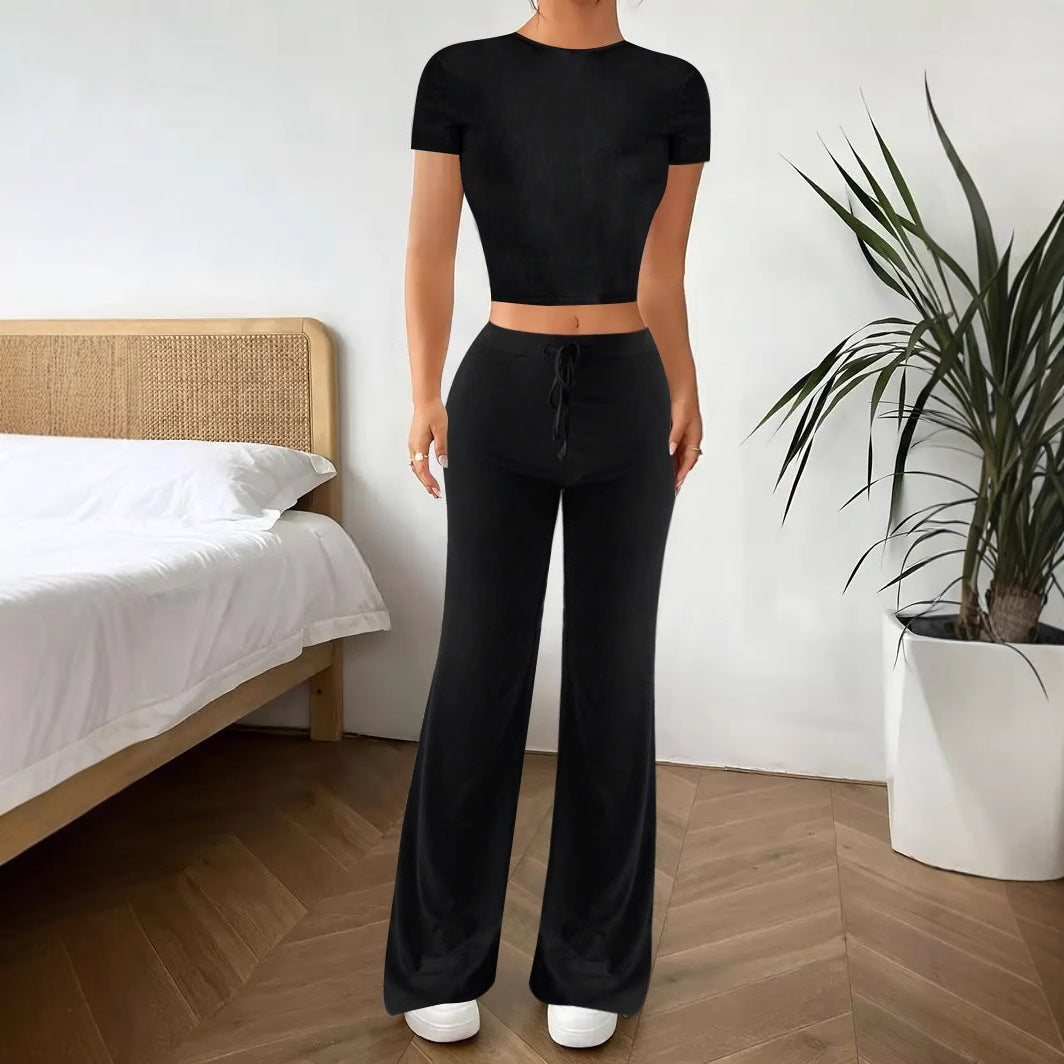 Dame Lækkert koordinatsæt med cropped top og løstsiddende bukser Stilla
