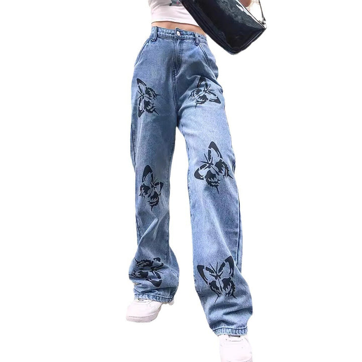 Dame brede jeans med iøjnefaldende sommerfugletryk Skovae