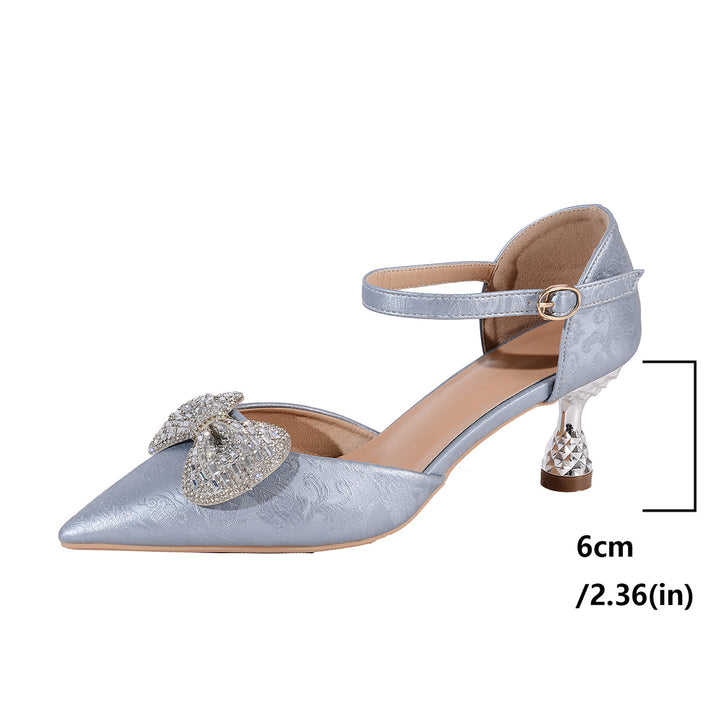 Dame elegante pumps med glimmerdetaljer og dekorativ sløjfe Stilla