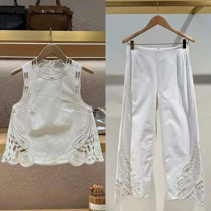 Dame ærmeløs top med kunstnerisk broderedesign og elegante detaljer Stilla