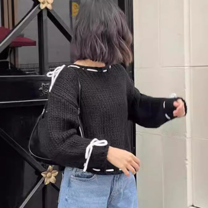 Kvindernes afslappede strikket sweater med åbne skuldre og snøre detaljer Stilla