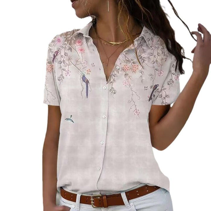 Damebluse med blomsterdesign og elegant snit Stilla