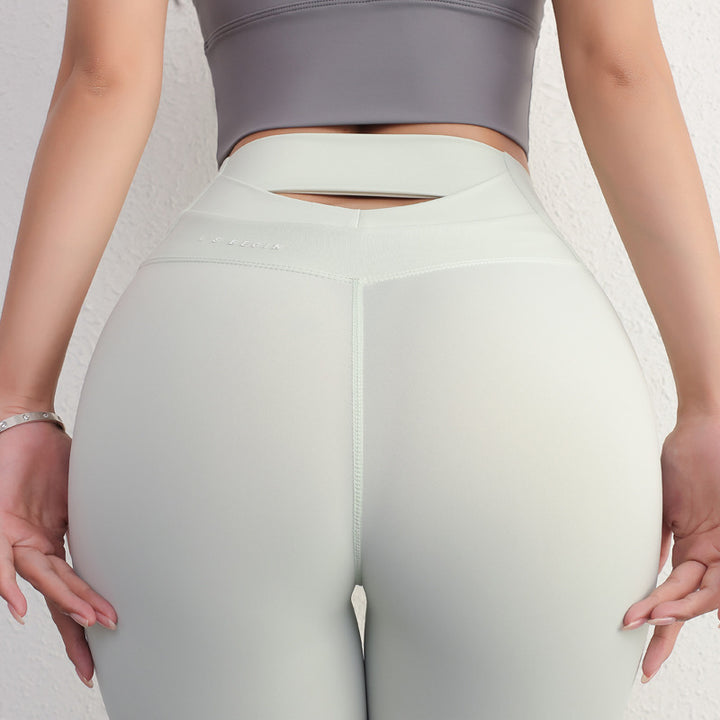 Dame Højtsiddende Slim-Fit Leggings med trendy Cut-Out og åndbart stof Stilla