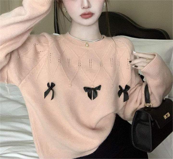 Kvinders hyggelige sweater med legende bueapplikationer Stilla