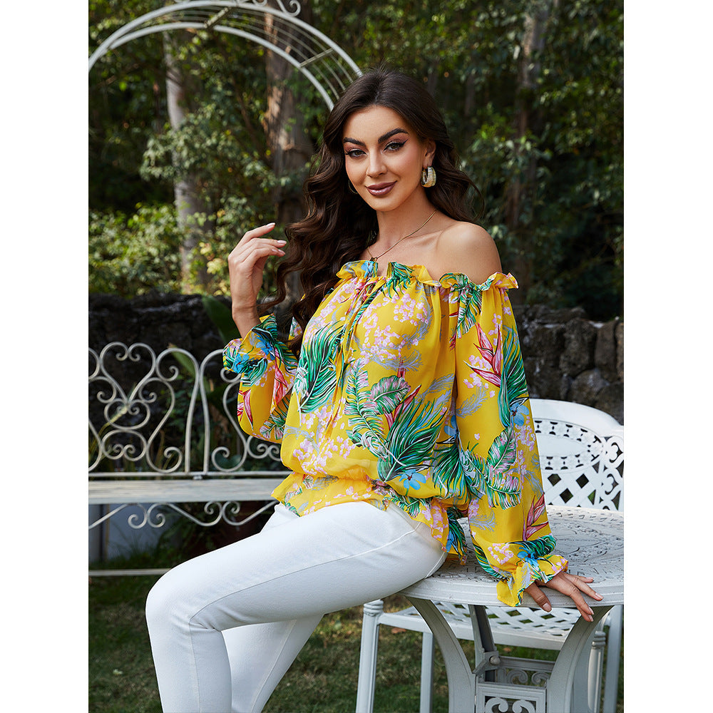 Damer off-shoulder bluse med blomsterdesign og flæsedetaljer Stilla