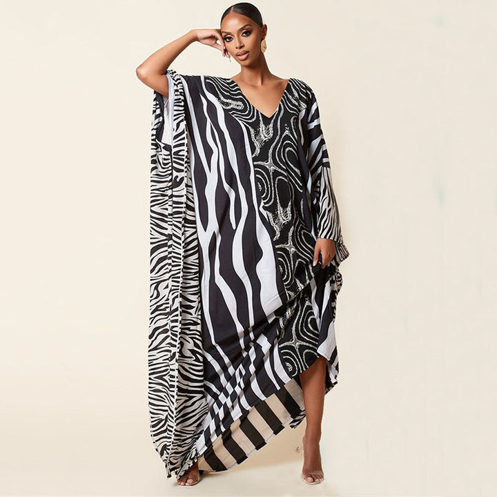 Dame elegant Kaftan med kunstnerisk zebramønster og glitrende accenter Stilla