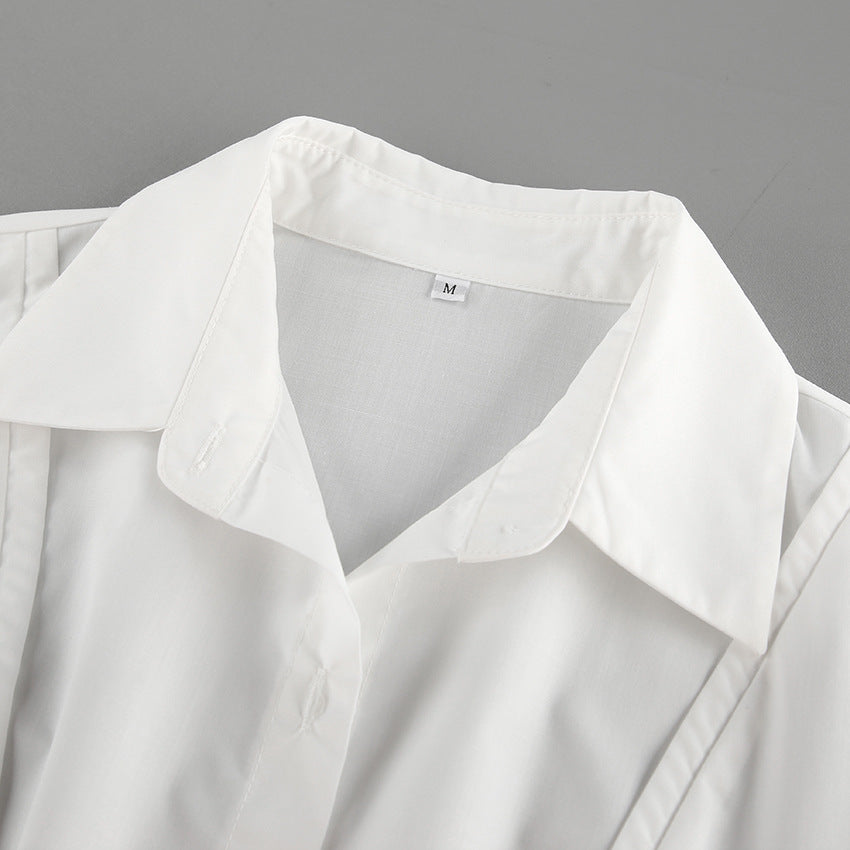 Dame skjortekjole med elegante flæsedetaljer og bindebælte Stilla
