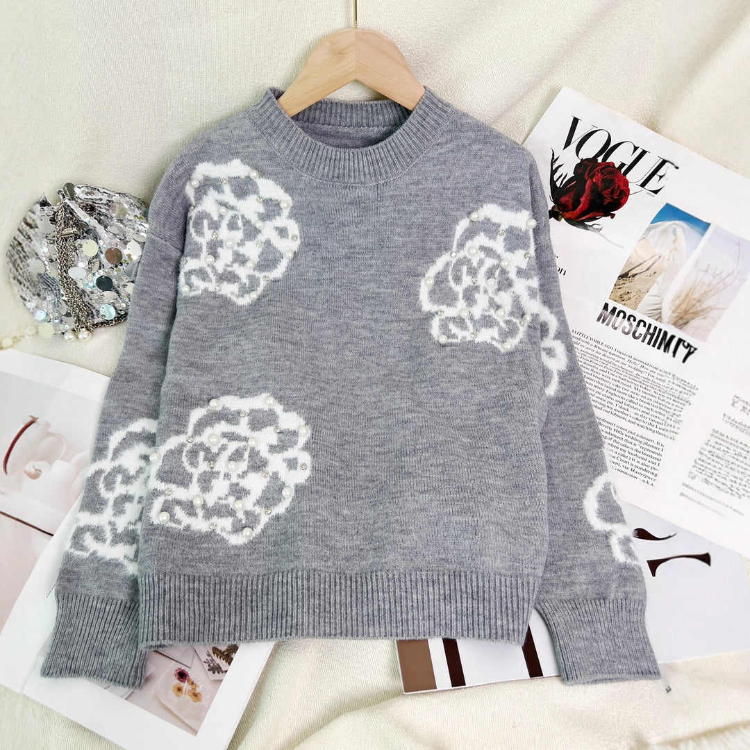 Damer fashionabel pullover med udsøgte blomsterapplikationer og perleudsmykninger Stilla