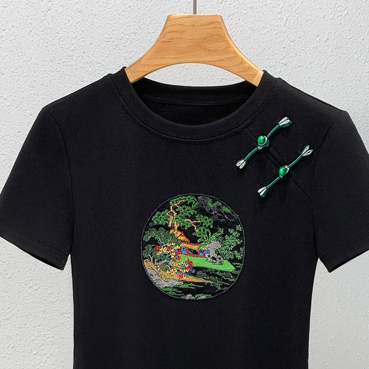 Dame T-shirt med kunstnerisk broderedesign og dekorative applikationer Stilla