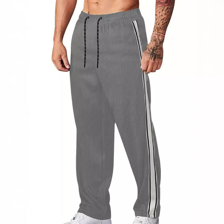 Herren nan ribbet Relax-Joggingbukser med bred ben, siden piping og elastisk snørebånd Skovae
