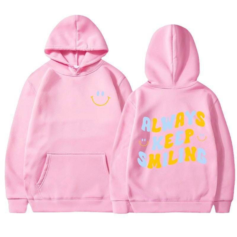 Dame hoodie med munter skrift og praktiske kangaroo lommer Skovae
