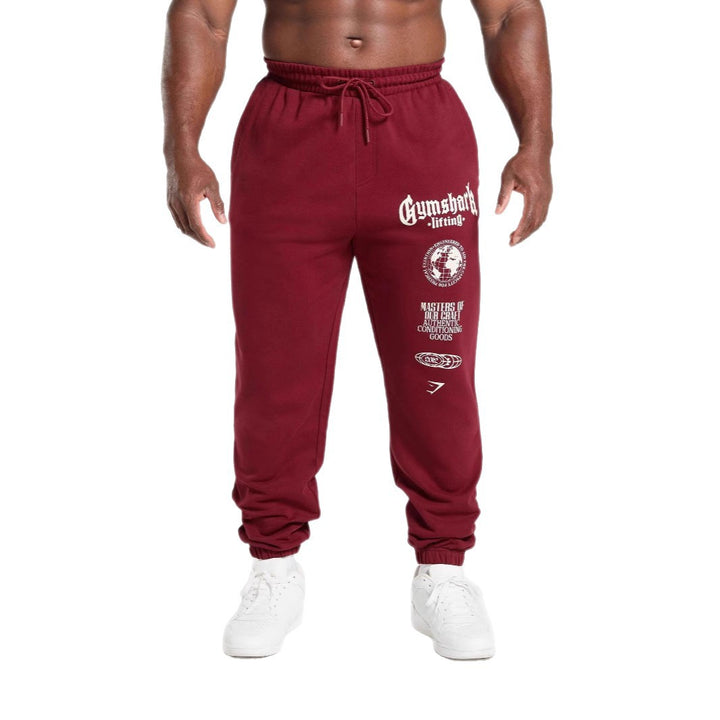 Herre nan konisk skåret bomuldsfleece-sweatpants med elastisk snoretræk ribbede benafslutninger og stort logotryk Skovae