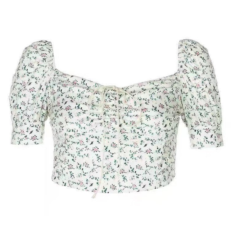 Kvindernes crop top med puffærmer og blomstermotiv