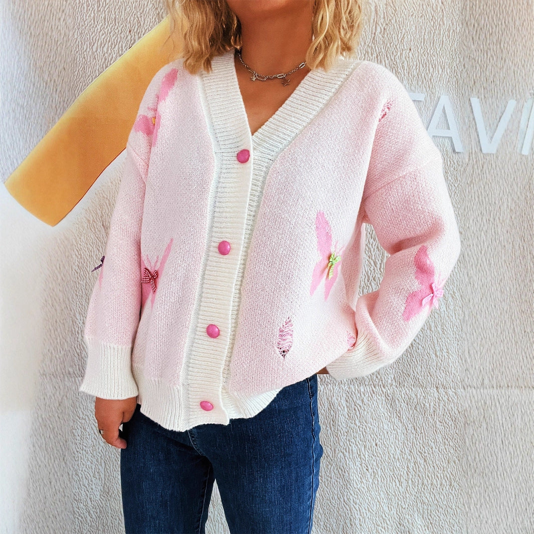 Damer hyggelig cardigan med farverigt sommerfugledesign og knapliste Stilla