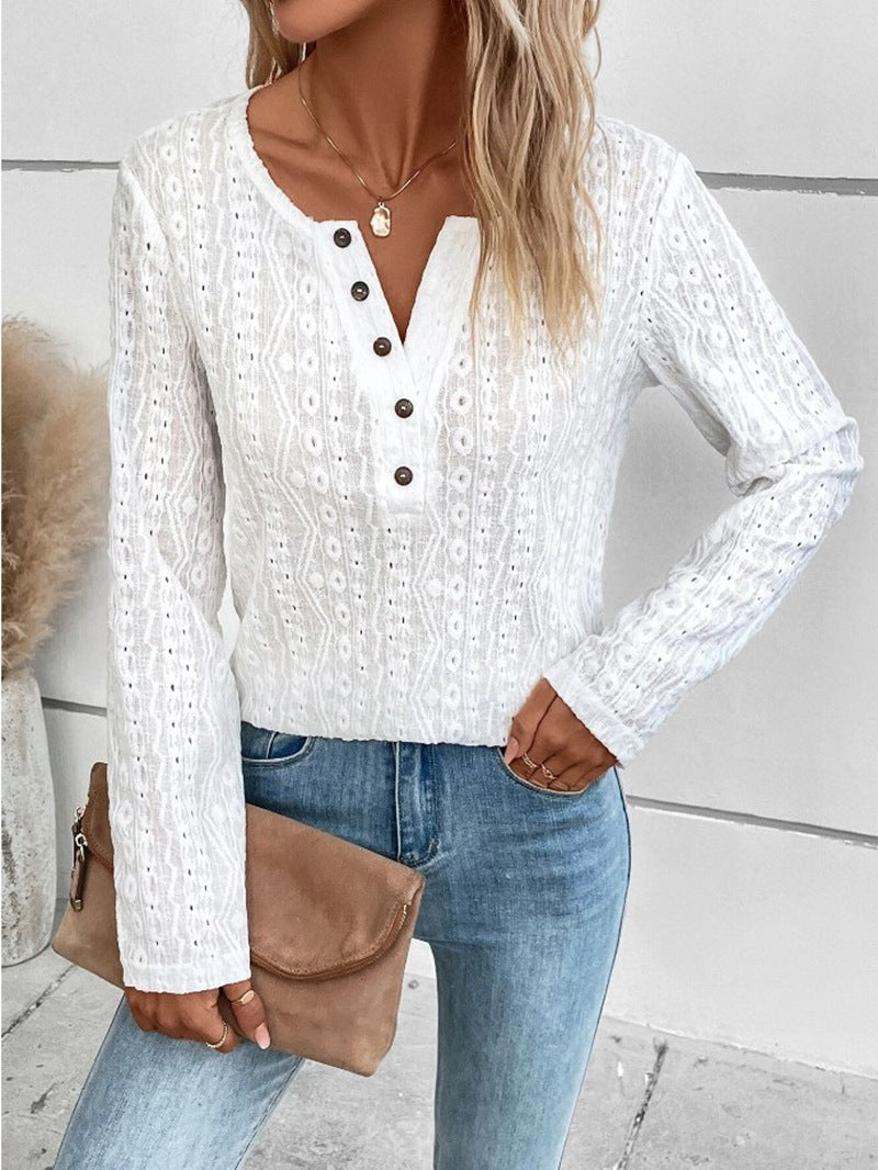 Dame elegant langærmet blouse med knapdetaljer og fint strukturmønster Stilla