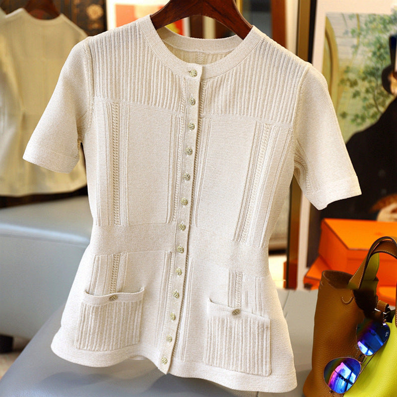 Dame strikbluse med struktureret design og praktiske lommer Stilla
