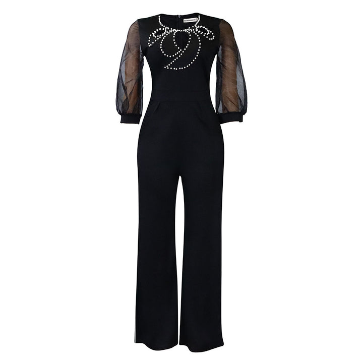 Dame Elegante Jumpsuit med gennemsigtige ærmer og smykker detaljer Stilla