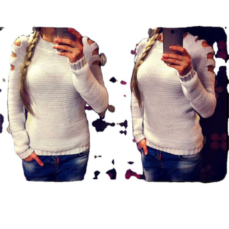 Dame strikket sweater med åbent skulderdesign og glitrende accenter Stilla
